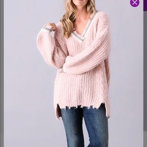 Pink raw edge sweater